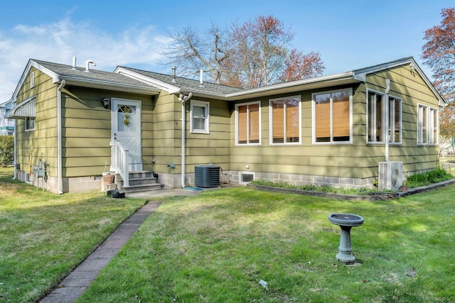 36 W Virginia Ave, Villas, NJ 08251 - back of house with a lawn, central AC, entry steps, and ac unit