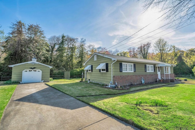 36 W Virginia Ave, Villas, NJ 08251 - view of property exterior with a garage, an outbuilding, a lawn, concrete driveway, and fence