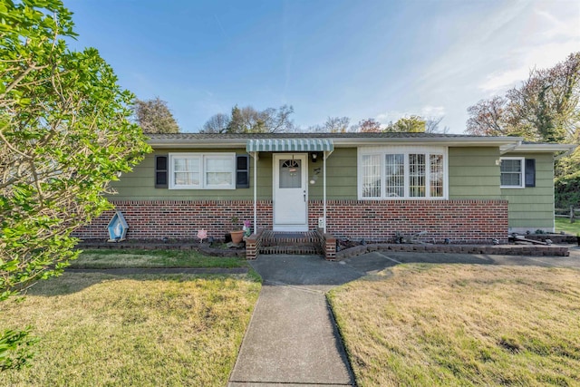 36 W Virginia Ave, Villas, NJ 08251 - ranch-style home with a front lawn and brick siding