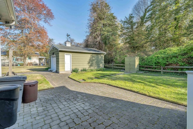 36 W Virginia Ave, Villas, NJ 08251 - view of patio / terrace with an outdoor structure and fence