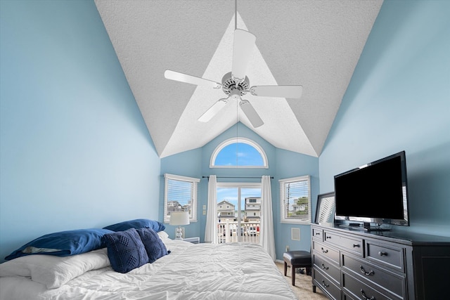 bedroom featuring light carpet, access to exterior, vaulted ceiling, and a textured ceiling