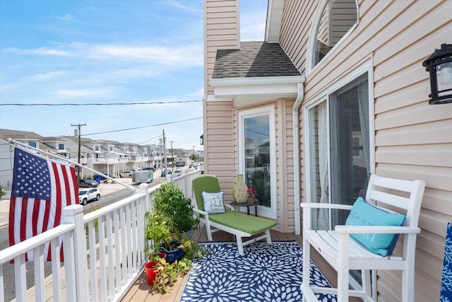 balcony featuring a residential view