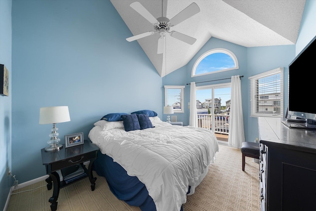 bedroom featuring a textured ceiling, light colored carpet, a ceiling fan, baseboards, and access to outside