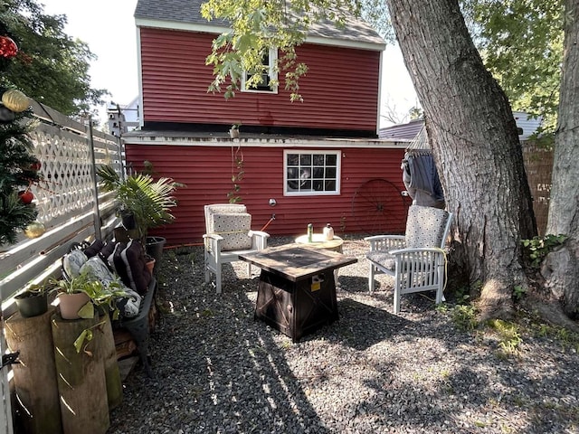 35 Bayshore Rd, Green Creek, NJ 08219 - back of house featuring an outdoor fire pit and a shingled roof