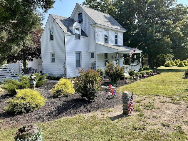 35 Bayshore Rd, Green Creek, NJ 08219 - view of front of house featuring a porch, a front lawn, and roof with shingles