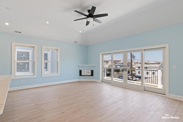 403 E Glenwood Ave Unit 15, Wildwood, NJ 08260 - unfurnished living room with light wood-type flooring, ceiling fan, recessed lighting, a fireplace, and vaulted ceiling