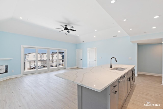 403 E Glenwood Ave Unit 15, Wildwood, NJ 08260 - kitchen featuring stainless steel dishwasher, light wood-style floors, open floor plan, a center island with sink, and recessed lighting