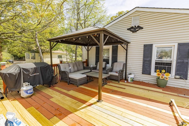 wooden terrace with a gazebo and outdoor lounge area