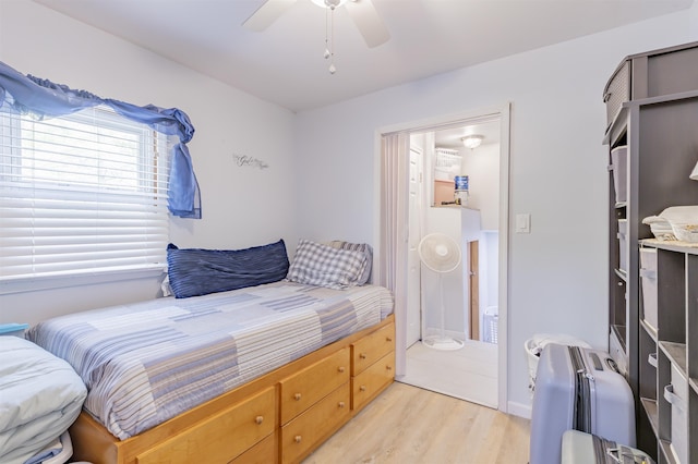 bedroom with light wood finished floors and ceiling fan