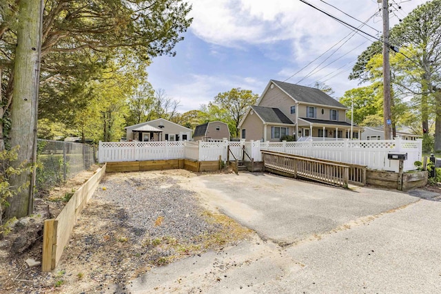view of front of property with fence