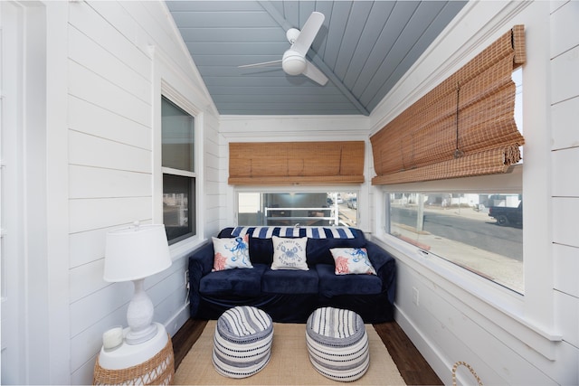 sunroom with wooden ceiling, ceiling fan, and vaulted ceiling