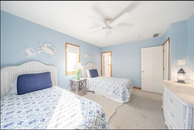 141 8th St, Avalon, NJ 08202 - bedroom featuring light colored carpet and a ceiling fan