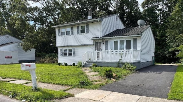 view of front of home with a front yard