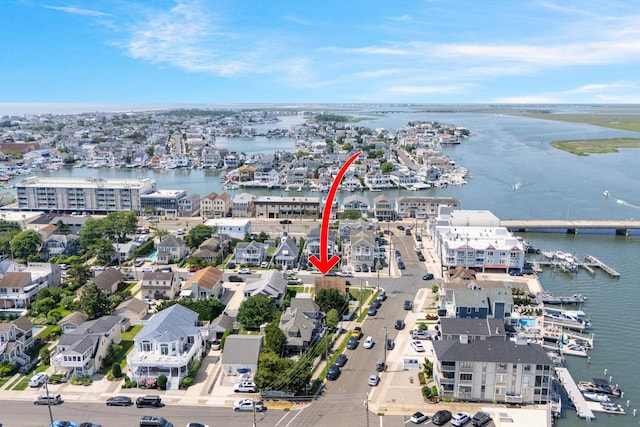 396 95th St, Stone Harbor, NJ 08247 - aerial overview of property's location featuring a large body of water and a marina