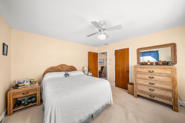396 95th St, Stone Harbor, NJ 08247 - bedroom featuring light carpet, a ceiling fan, and a closet
