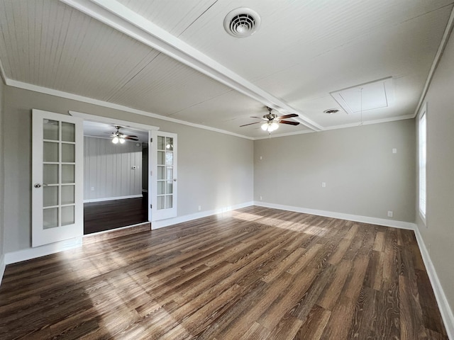 empty room featuring french doors, ornamental molding, and wood-type flooring