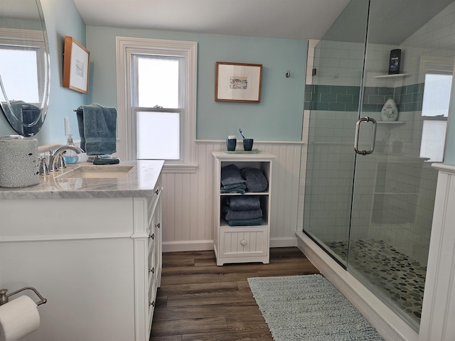 408 E 7th Ave, North Wildwood, NJ 08260 - bathroom featuring a wainscoted wall, vanity, wood finished floors, and a shower stall