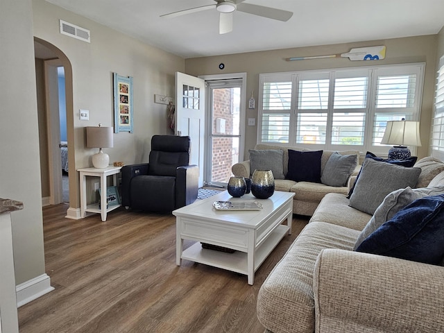 408 E 7th Ave, North Wildwood, NJ 08260 - living room with a ceiling fan, baseboards, visible vents, wood finished floors, and arched walkways