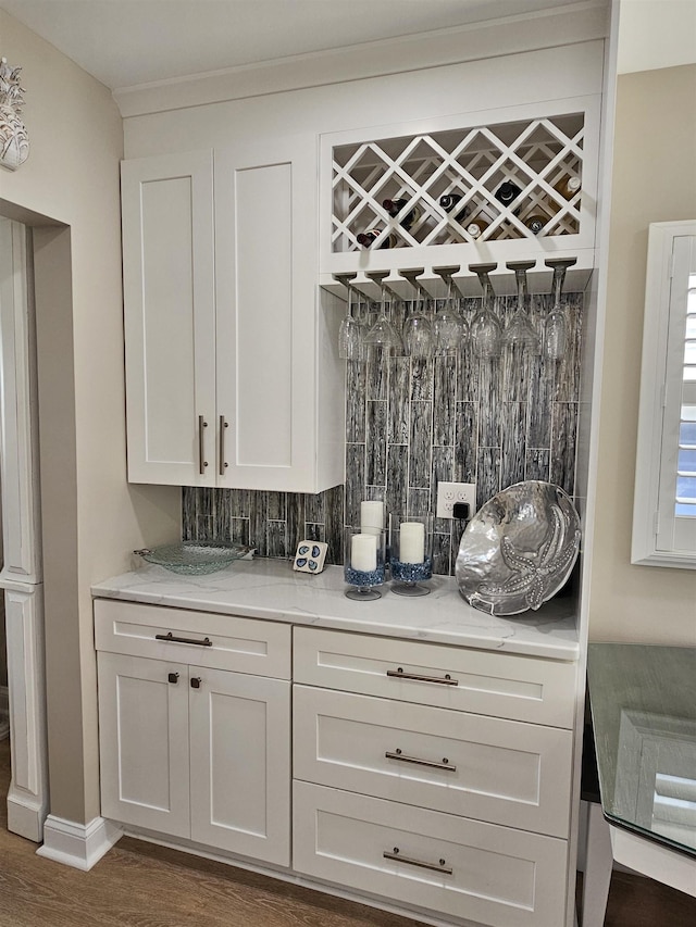 408 E 7th Ave, North Wildwood, NJ 08260 - bar featuring a bar, dark wood-style floors, and backsplash