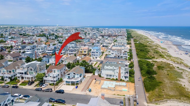 53 E 25th St, Avalon, NJ 08202 - aerial view of property and surrounding area with waterfront with a beach and nearby suburban area