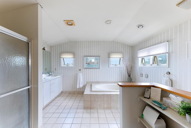 53 E 25th St, Avalon, NJ 08202 - full bath with lofted ceiling, tile patterned floors, vanity, a garden tub, and a shower with door
