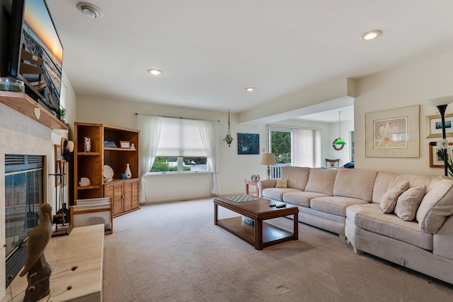 53 E 25th St, Avalon, NJ 08202 - living room with carpet, recessed lighting, and a tiled fireplace