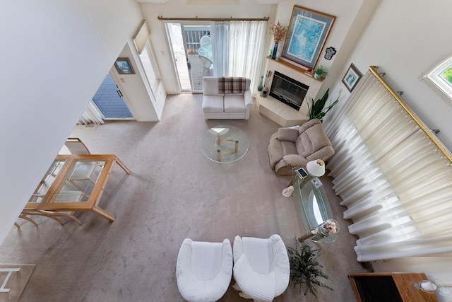 53 E 25th St, Avalon, NJ 08202 - carpeted living room with a tile fireplace