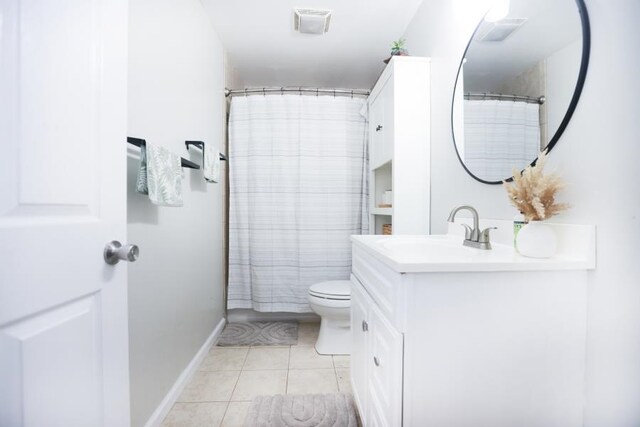 14 Freedom Dr, Erma, NJ 08204 - bathroom featuring tile patterned flooring, vanity, toilet, baseboards, and a shower with curtain