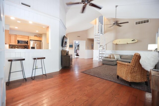 14 Freedom Dr, Erma, NJ 08204 - living area with ceiling fan, high vaulted ceiling, and wood finished floors