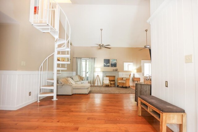 14 Freedom Dr, Erma, NJ 08204 - living room with a ceiling fan, light wood finished floors, high vaulted ceiling, and a fireplace