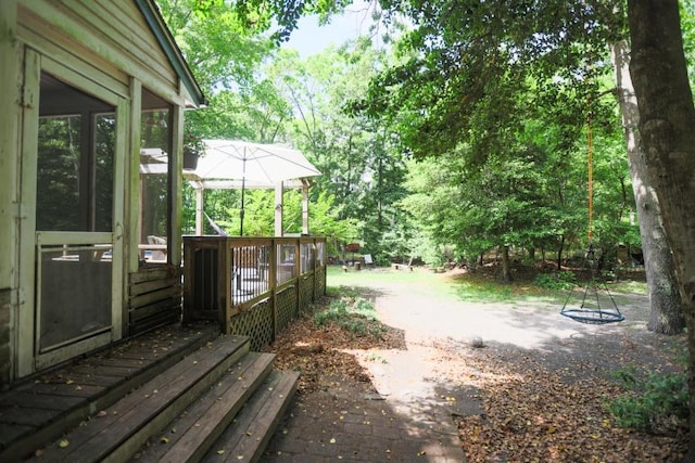 14 Freedom Dr, Erma, NJ 08204 - view of yard featuring a deck and a sunroom