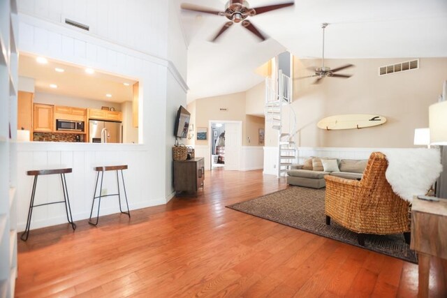 14 Freedom Dr, Erma, NJ 08204 - living room featuring ceiling fan, light wood-style floors, and high vaulted ceiling