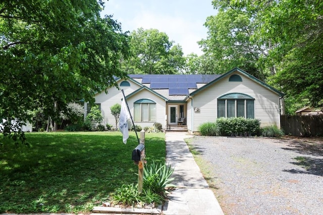 14 Freedom Dr, Erma, NJ 08204 - ranch-style home featuring solar panels and a front lawn