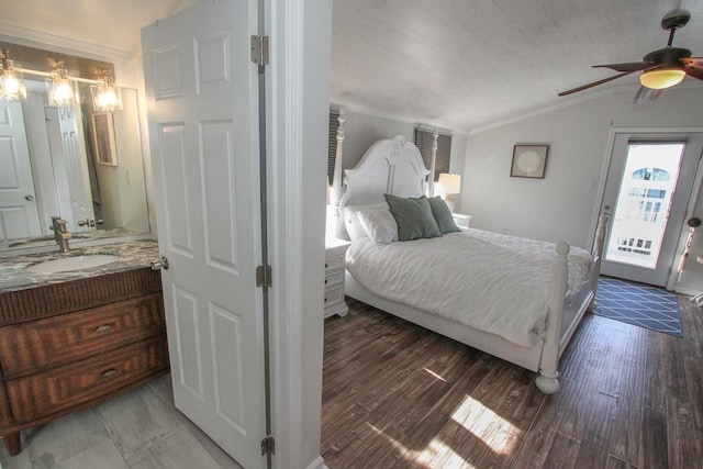 bedroom with ceiling fan, dark hardwood / wood-style flooring, access to outside, and vaulted ceiling