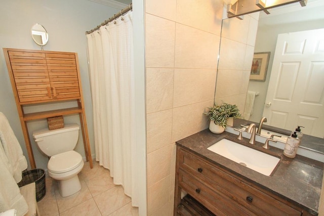 bathroom featuring tile patterned floors, toilet, vanity, tile walls, and a shower with shower curtain