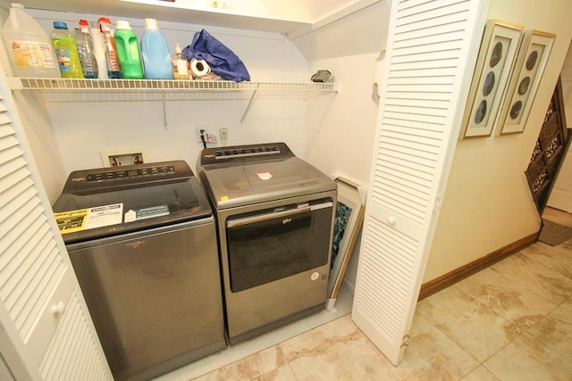 clothes washing area with independent washer and dryer