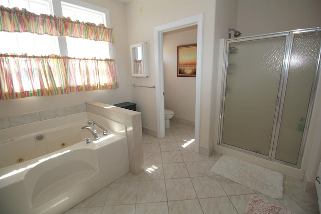 bathroom with tile patterned floors, plus walk in shower, and toilet