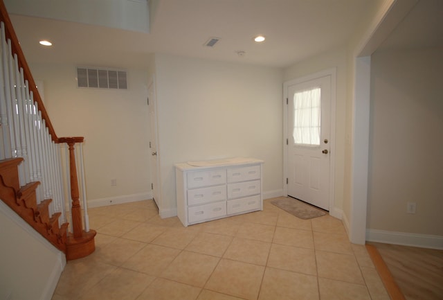 view of tiled foyer entrance