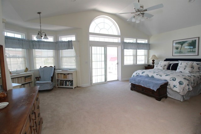 bedroom featuring carpet flooring, multiple windows, ceiling fan, and lofted ceiling