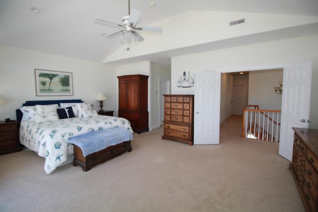 bedroom featuring ceiling fan, light colored carpet, and lofted ceiling