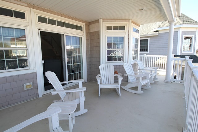 view of patio featuring a porch