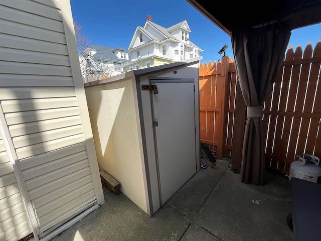 view of side of property with fence