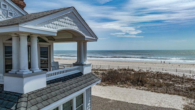 view of water feature with a beach view