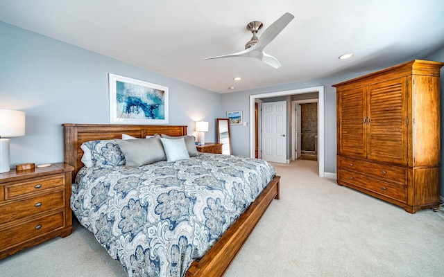 bedroom with light carpet, ceiling fan, baseboards, and recessed lighting