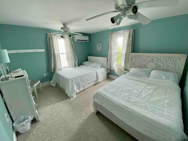 carpeted bedroom with a wall unit AC, multiple windows, and ceiling fan