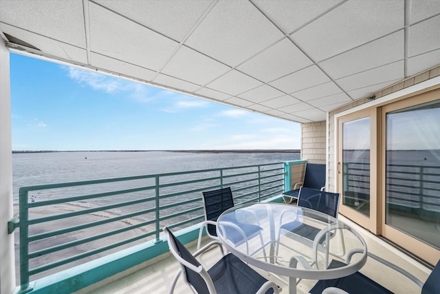 9400 Roberts Ave Unit 306, Sea Isle City, NJ 08243 - balcony featuring a water view and outdoor dining area