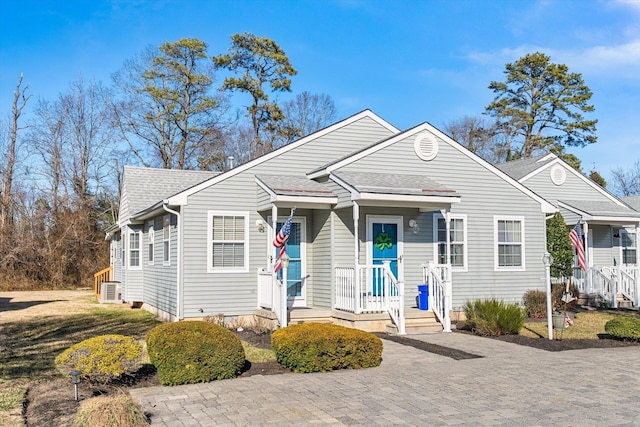 view of front of home with roof with shingles