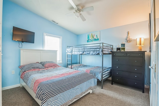 bedroom featuring carpet floors, ceiling fan, and lofted ceiling