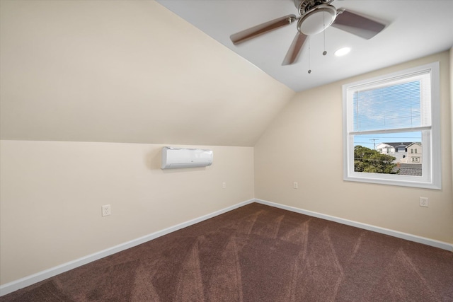 bonus room with carpet flooring, a wall mounted AC, ceiling fan, and lofted ceiling