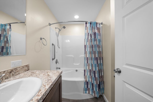 bathroom featuring vanity and shower / tub combo with curtain